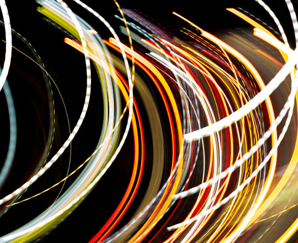 long exposure colors over black background, yellow, red, purple, blue