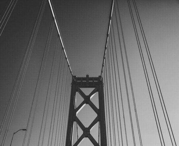 black and white top part of a bridge