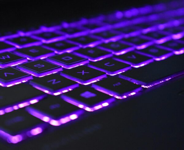 close up of purple under lit keyboard
