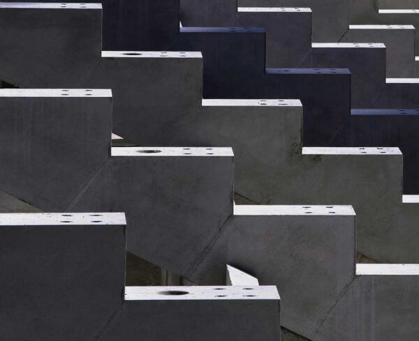 black and gray image with concrete stair link structures