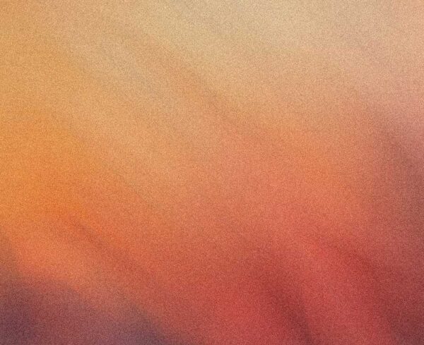 a orange grainy image showing a sense of movement