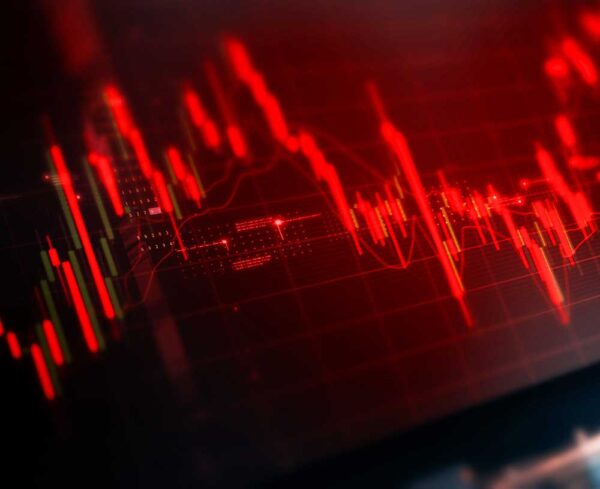 a red fintech / crypto ticker rising and falling