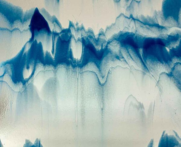 Blue and white ink blot with upper blue section