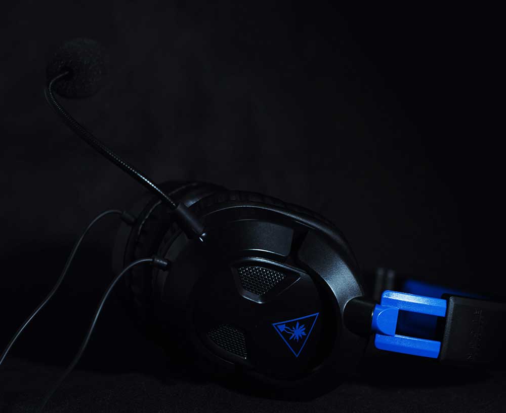 Gaming headset in the dark with blue accents