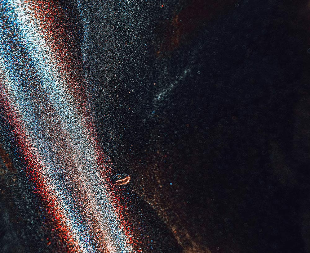 textured surface with black on the right and rainbow structure on left, ITC investigations