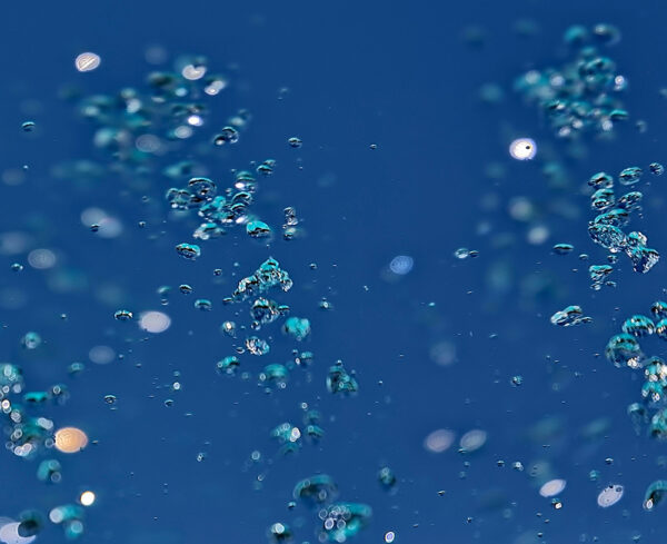 blue background, blue bubbles rising up