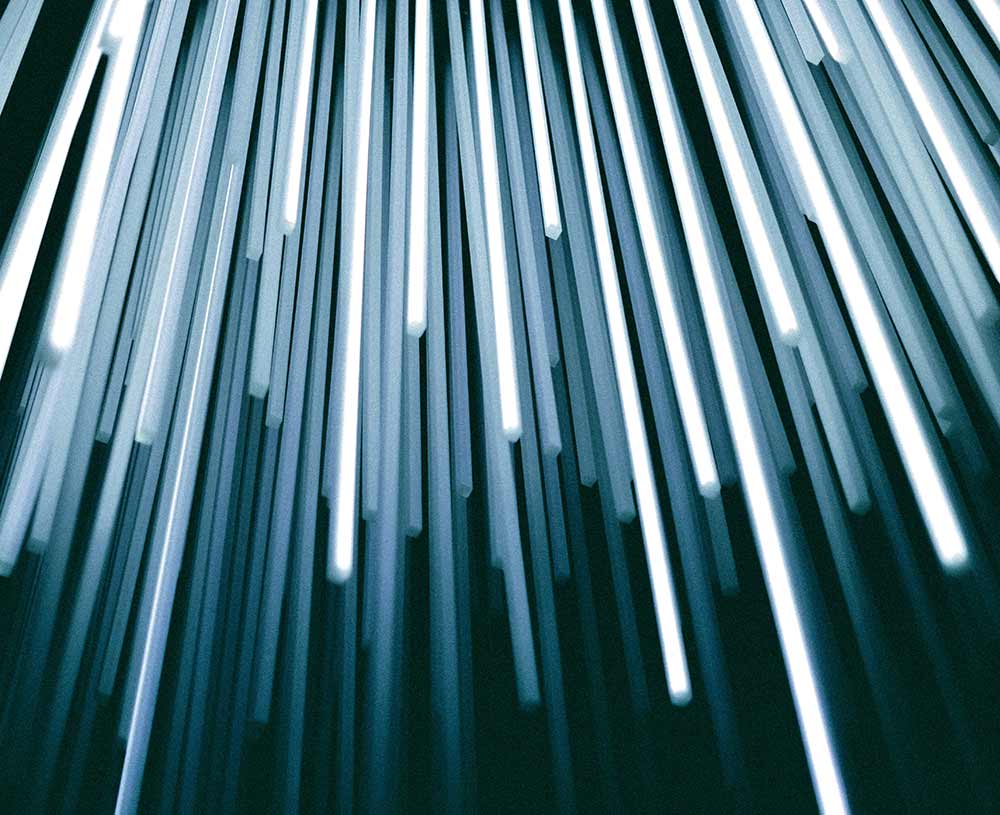 Long light bars hanging down from ceiling