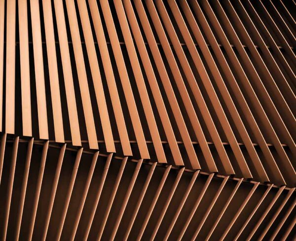 Copper lines with light and dark areas, with the top half veering right and the bottom veering left