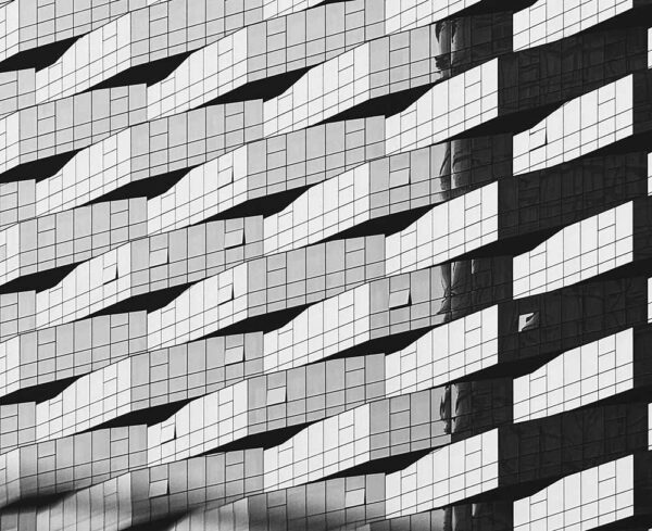 black and white facade of building windows