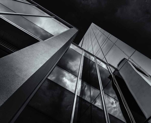 grey scale camera tilted upward, black sky