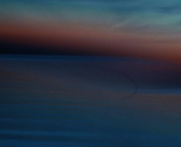 various colors resembling a sunset with blue, red, orange, green colors