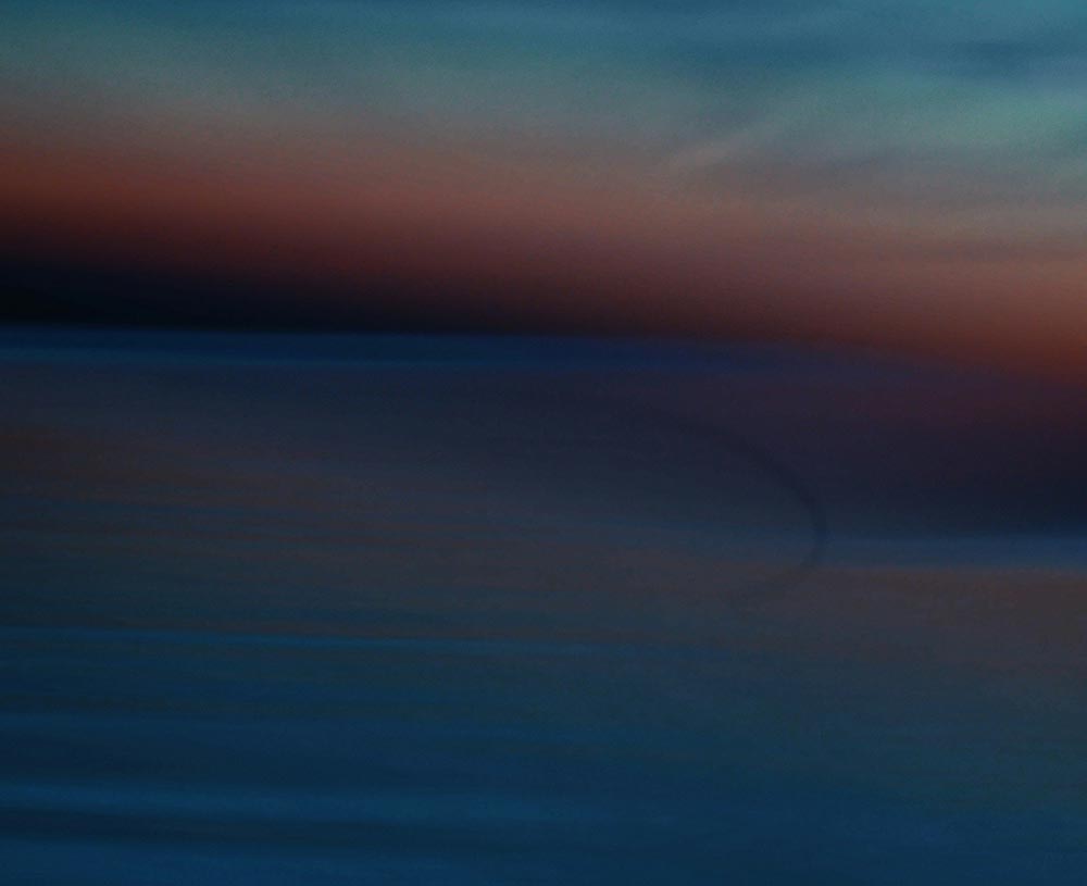 various colors resembling a sunset with blue, red, orange, green colors