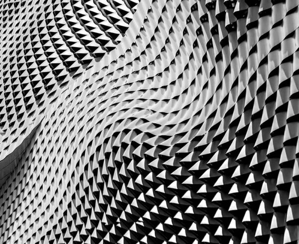 black and white abstract points forming in waves