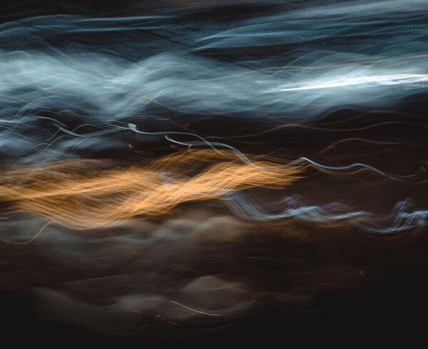 white and copper lines indicating movement on a black background