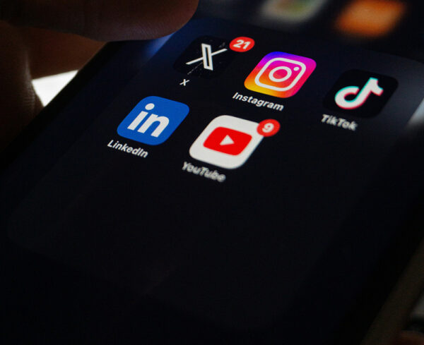 close up of dark mode iphone social media apps