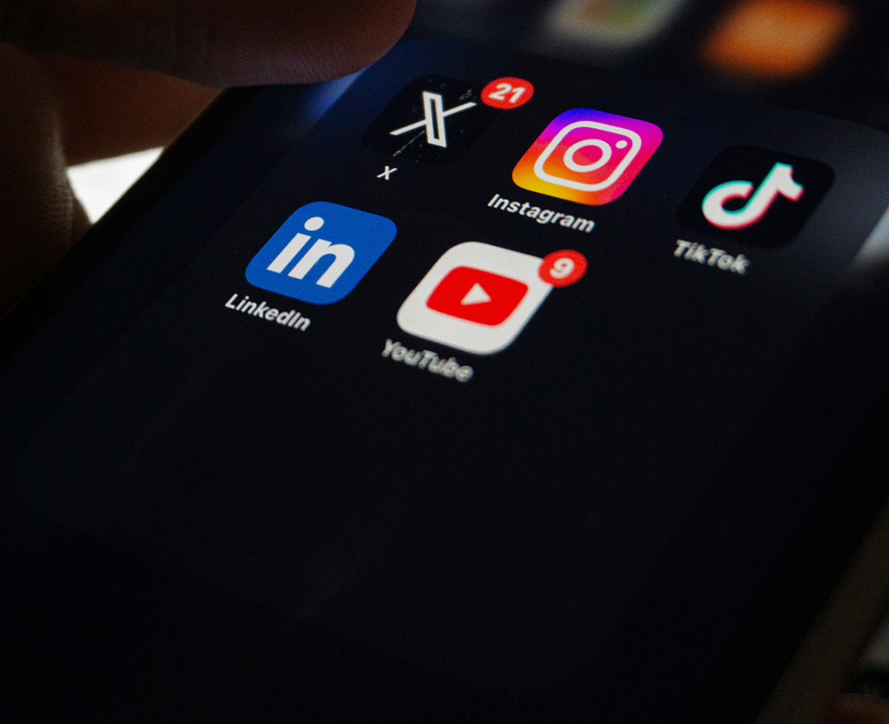 close up of dark mode iphone social media apps